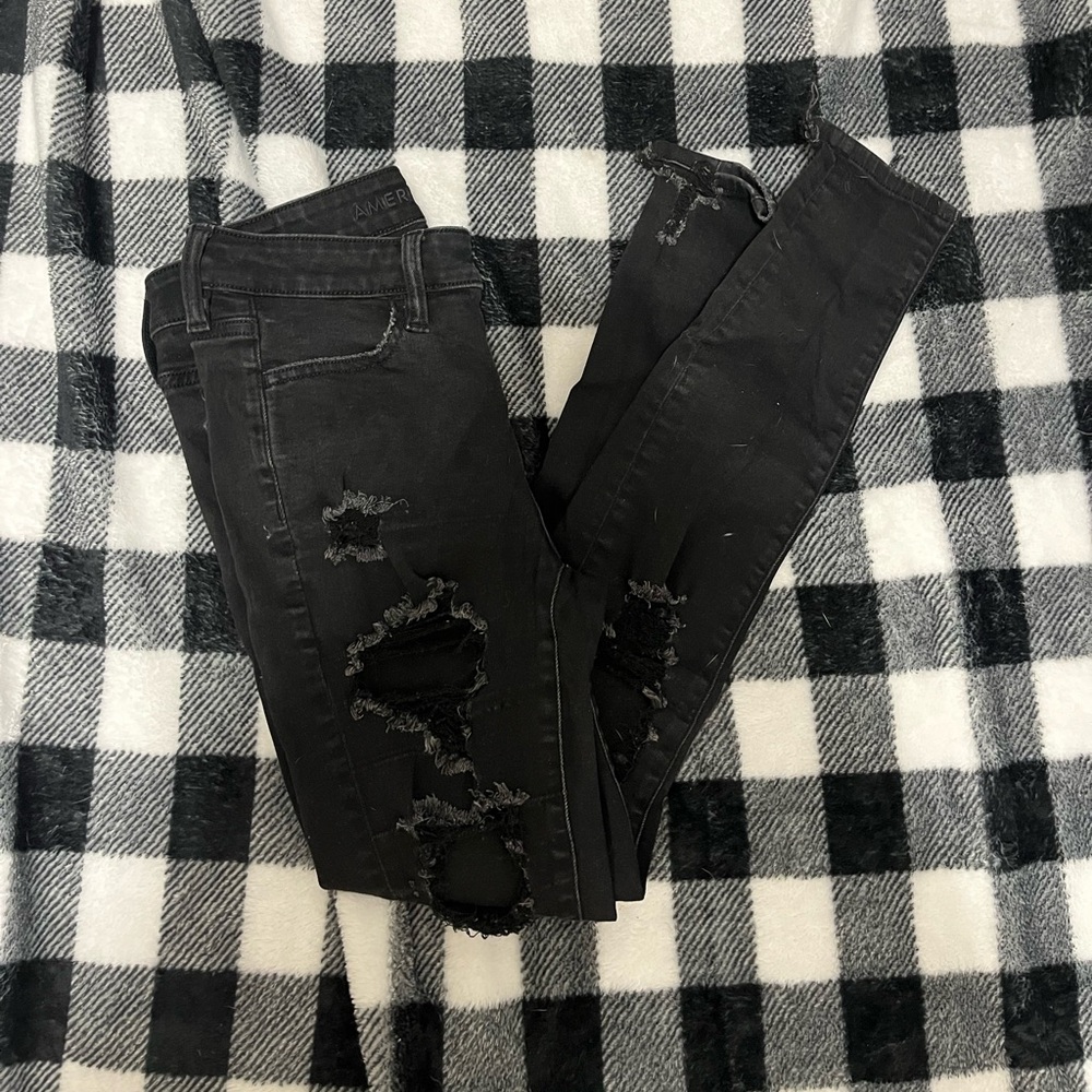 SOLD American Eagle black Ripped/ Distressed skinny jean